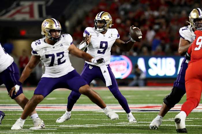 Washington Huskies quarterback Michael Penix Jr. (9) makes a pass in the second half at Arizona Stadium.